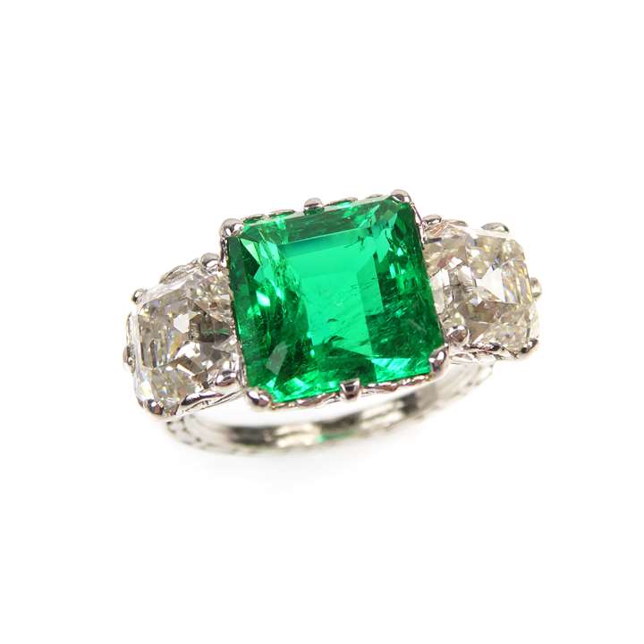 Three stone emerald and diamond ring